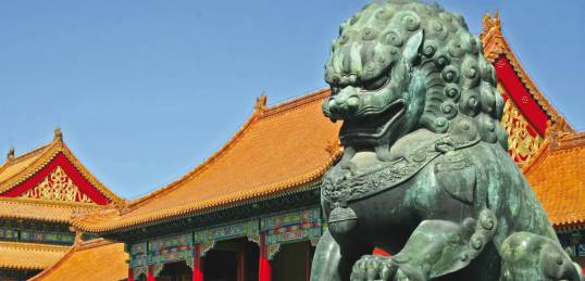Guardian lion statue at the Forbidden City in Beijing