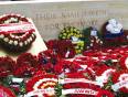 Red poppy wreaths at an ANZAC memorial at ANZAC Cover in Turkey