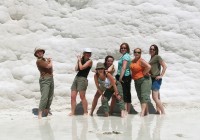 A tour group posing at the white limestone terraces of Pammukale