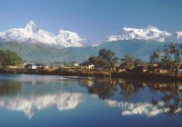 Lake Phewa in Pokhara, with panoramic views of the Himalayan mountains