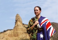 A Bugler at Anzac day, wearing the Australian flag