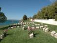 People paying their respects to war graves at Anzac Cove