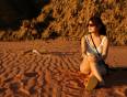 Girl in contemplation sitting in the Wadi Rum Desert