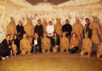 An On The Go China Tour group pose in Xi'an with the Terracotta Warriors
