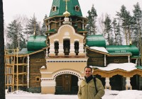 A man standing outside Ganina Yama - a monastic complex in Yekaterinburg