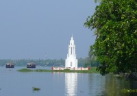 A church on the plam fringed shores of the Kerala backwaters
