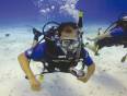 Man diving at the bottom of the Red Sea