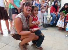 A tour member with one of the little girls at an orphanage in Cairo