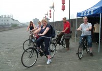 Enjoying a bike ride on the medieval city wall of Xi'an on one of our China Tours