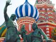 The statue and brightly coloured roof of St Basil's Cathedral in Moscow