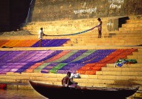 Fabrics left out to dry on the banks of the Ganges at Varanasi