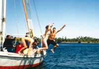 Felucca fun - a group jumping over board into the River Nile in Egypt