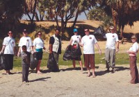 An on the go tour group cleaning up the banks of the Nile