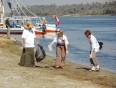 People cleaning up on the banks of the Nile
