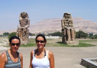 Girls in front of the Colossi of Memnon on Luxor's West Bank