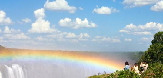 A rainbow over the mighty Victoria Falls