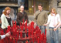 Light prayer candles outside the Big Wild Goose Pagoda in Xi'an on one of our China Tours