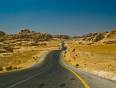 An undulating road through the Jordan landscape