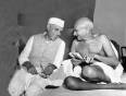 A photo of Gandhi chatting with Nehru