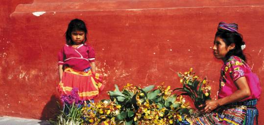 A local woman and child selling flowers in Guatemala