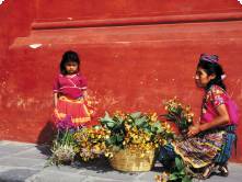 A local woman and child selling flowers in Guatemala
