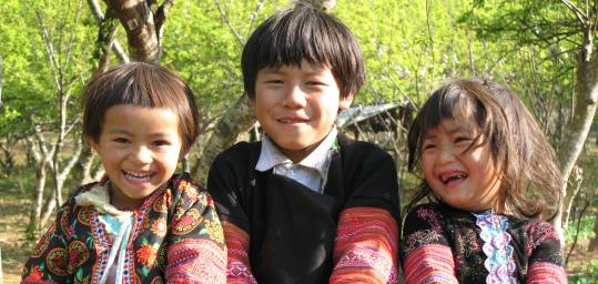 Local children from a village in Mai Chau - smiling faces of Vietnam