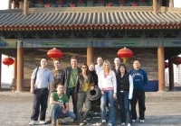 A group standing by a canon on the medieval Old City Wall in Xi'an