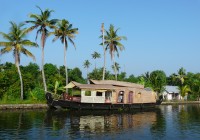 A Keralan rice boat or houseboat. The finest way to travel the back waters of Kerala