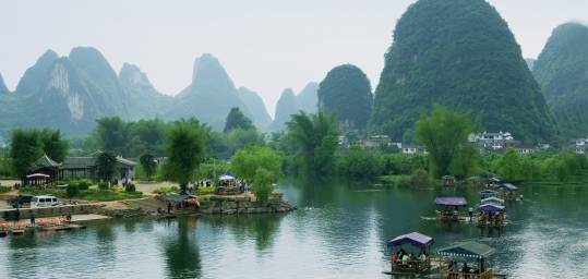 Bamboo rafts on the River Li in Yangshuo, with a backdrop of karst peaks