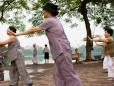 Women practising Tai Chi by Hoan Kiem Lake