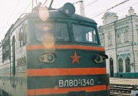 A green and red Trans-Siberian train