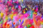 The beautiful brightly coloured powder paints of Holi, India's festival of colours, being thrown in