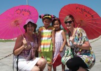 Local interaction in Tiananmen Square on one of our China Tours