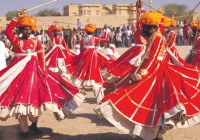 Local folk dancers having a whale of a time at Jaisalmer Desert Festival