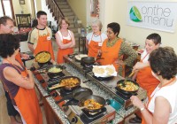 A group cooking at the India On The Menu cooking school in Goa