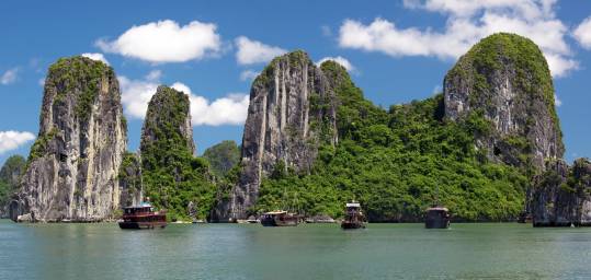 Relax on a junk boat in Halong Bay -  a must see on our Vietnam Tours.