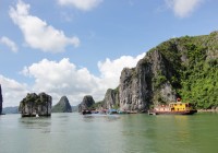 Relax on a junk boat in Halong Bay -  a must see on our Vietnam Tours.