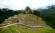 The early morning cloud dissipates to reveal stunning Machu Picchu on our Peru Tours 