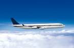 An airplane flying above the clouds
