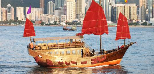 Iconic Junk Boat in the bay at Hong Kong
