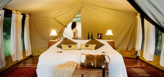 A permanent tent at Karen Blixen Camp in the Masai Mara on an African Lodge Safari