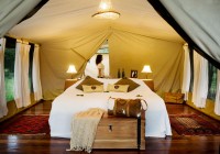 A permanent tent at Karen Blixen Camp in the Masai Mara on an African Lodge Safari