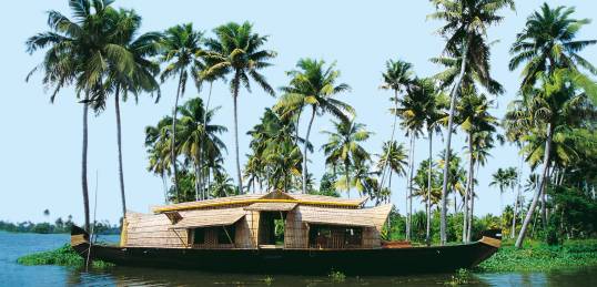 A Keralan house boat floating on the backwaters