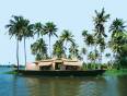 A Keralan house boat floating on the backwaters
