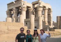 An on the go group standing outside the ancient temple of Kom Ombo in Egypt