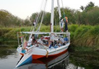 An on the go group onboard a felucca on the River Nile in Egypt