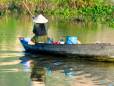A lady fishing in the river at Kompong Thom