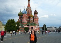 An on the go tours passenger outside St Basil's Cathedral in Moscow