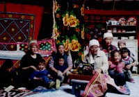 A Mongolian family inside their Ger