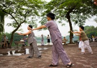 The residents of Hanoi often practise Tai Chi in the the early morning. 